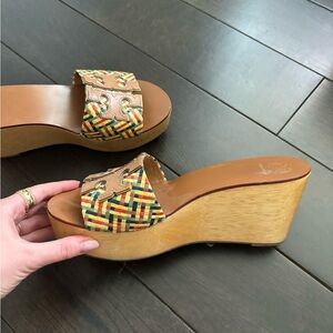 Tory Burch wood wedge sandals.